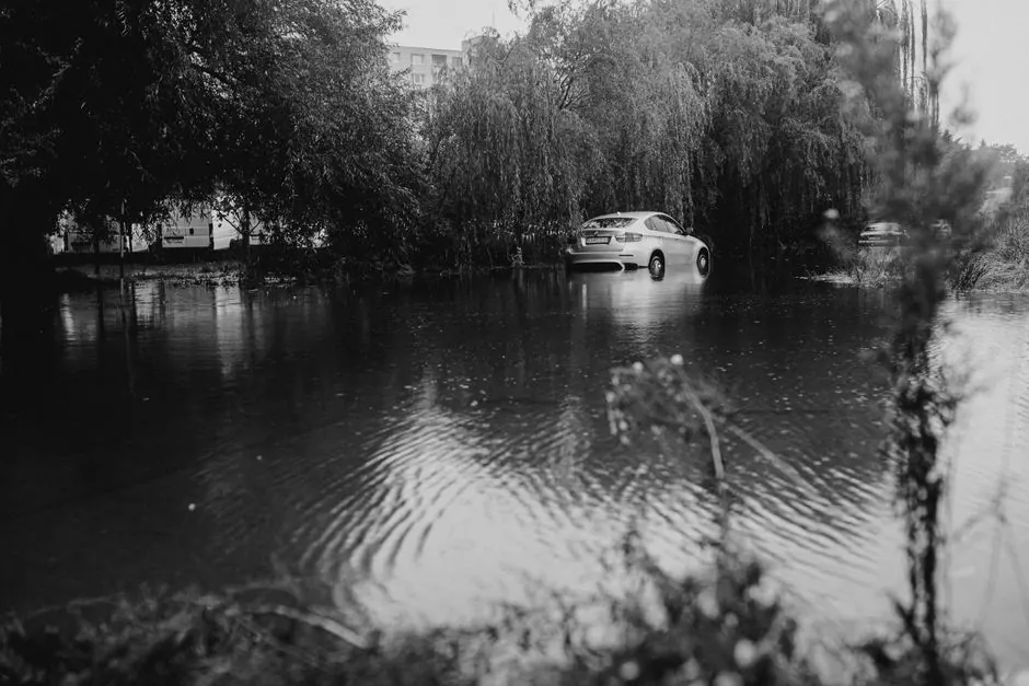 A car partly under floodwater